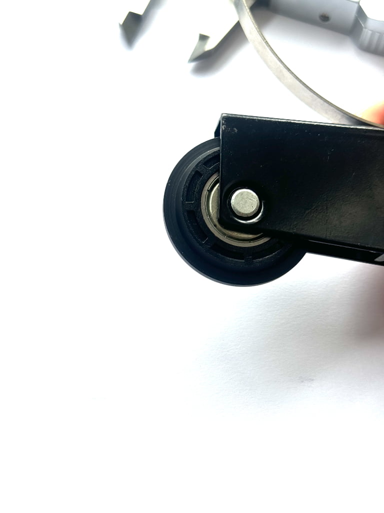 Close-up of custom Y-groove wheel for wardrobe sliding door roller