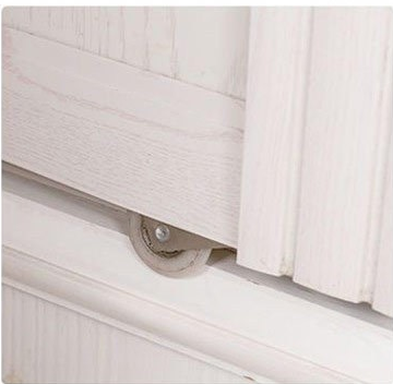 Anti-jump bottom roller installed on a wooden wardrobe sliding door
